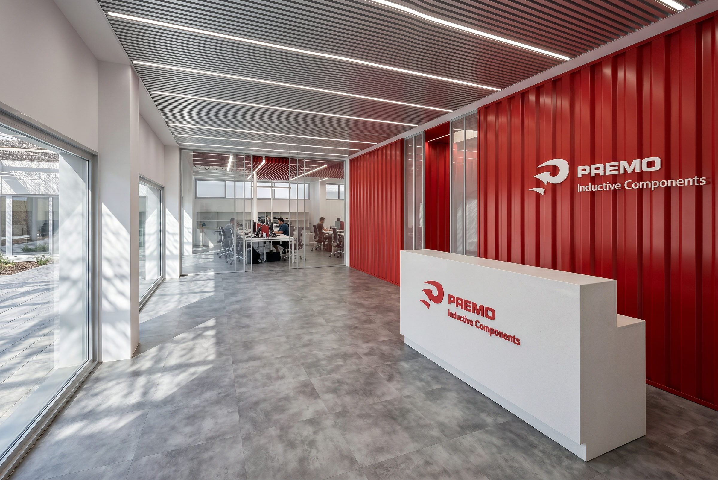Diseño interior oficinas PTA Grupo Premo Hall Portada